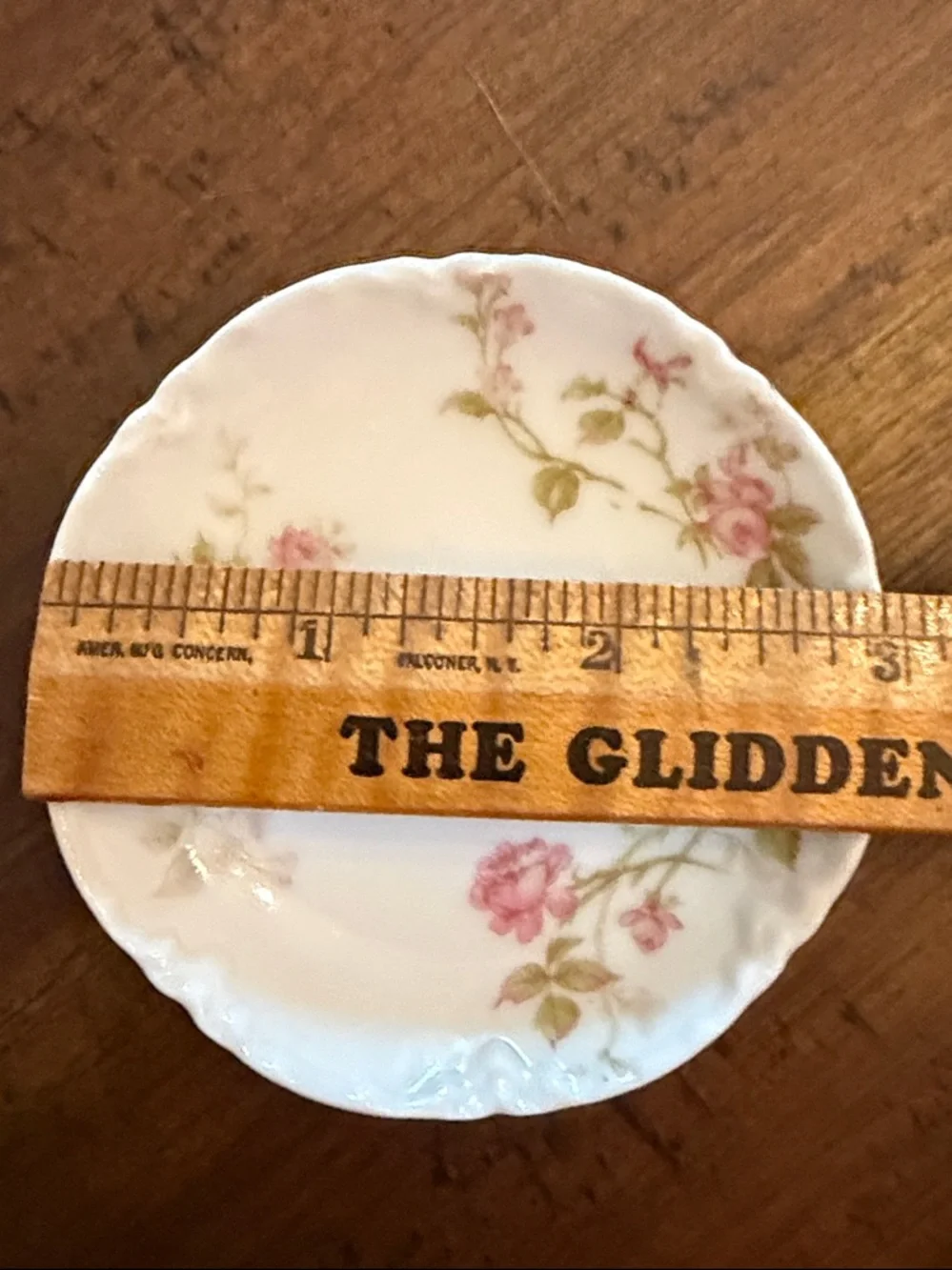 Haviland Limoges butter pat 3” with a beautiful scalloped edge